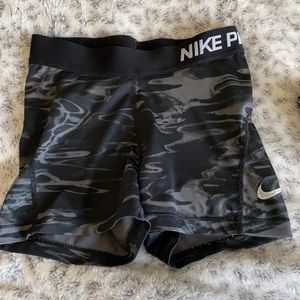 Black and Gray Nike Pro spandex shorts
